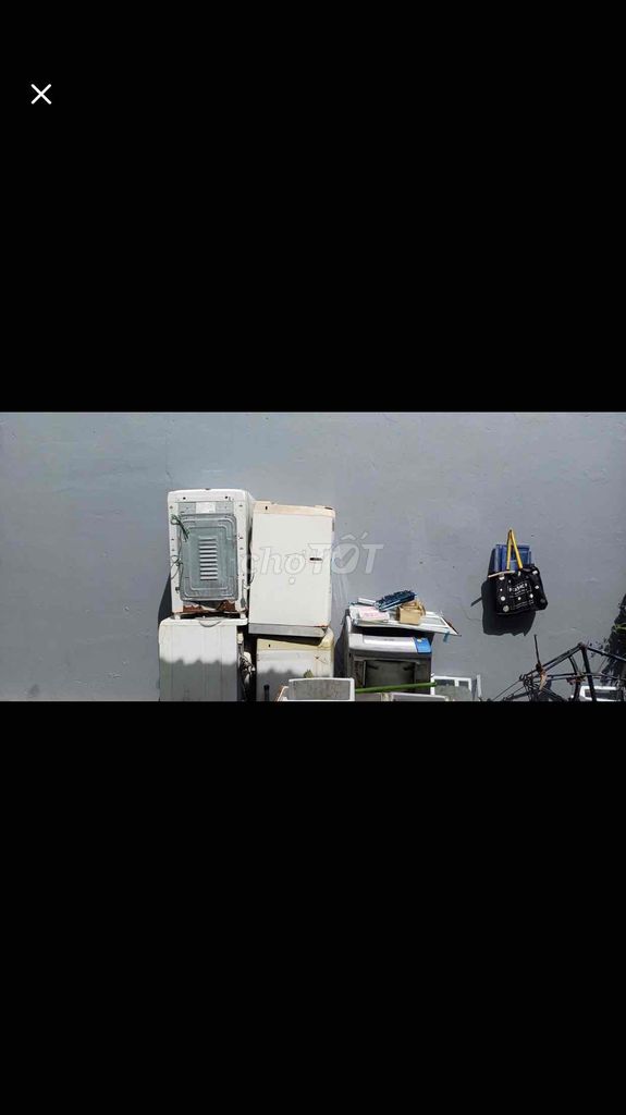 pas gấp 100 cái xác máy giặt