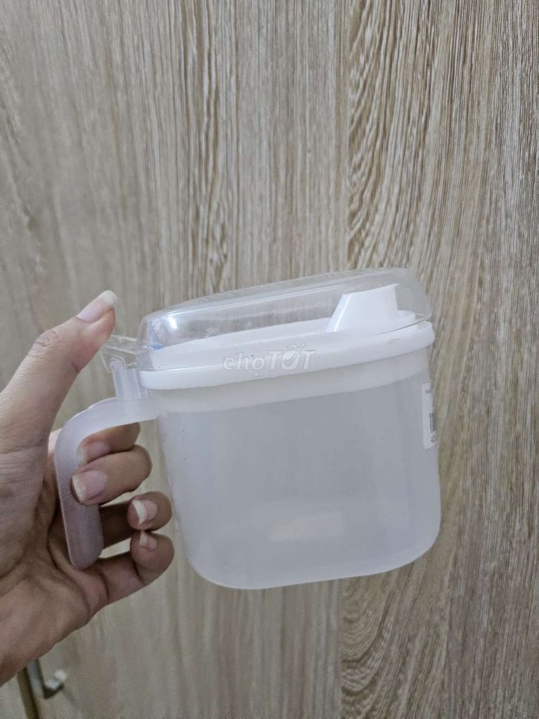 Bình đựng giấm, đồ nước. Mua bán Dụng cụ nhà bếp tại Quận Hai Bà Trưng Hà Nội được đăng bởi Phùng Thu Hương hình 1