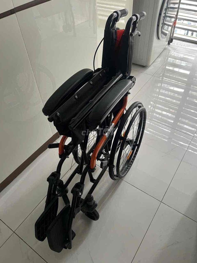 Xe lăn Kim loại Vải Đen Cam. Mua bán Giường, chăn ga gối nệm tại Quận Bình Thạnh Tp Hồ Chí Minh được đăng bởi NH I hình 1