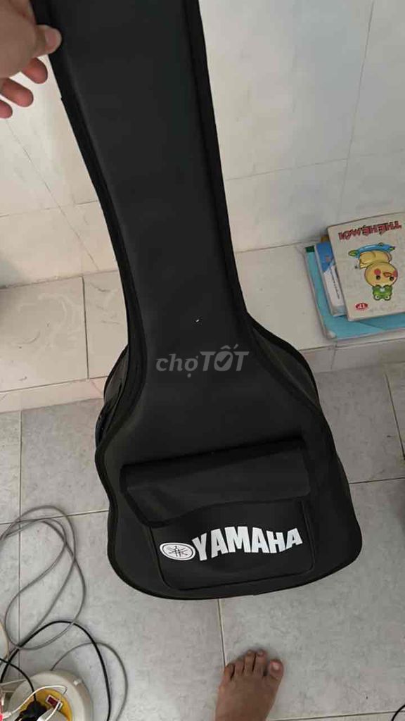 Đàn guitar Yamaha gỗ mới tặng kèm bao da dây đàn. Mua bán Nhạc cụ tại Quận 7 Tp Hồ Chí Minh được đăng bởi Khoa đi lạc hình 1
