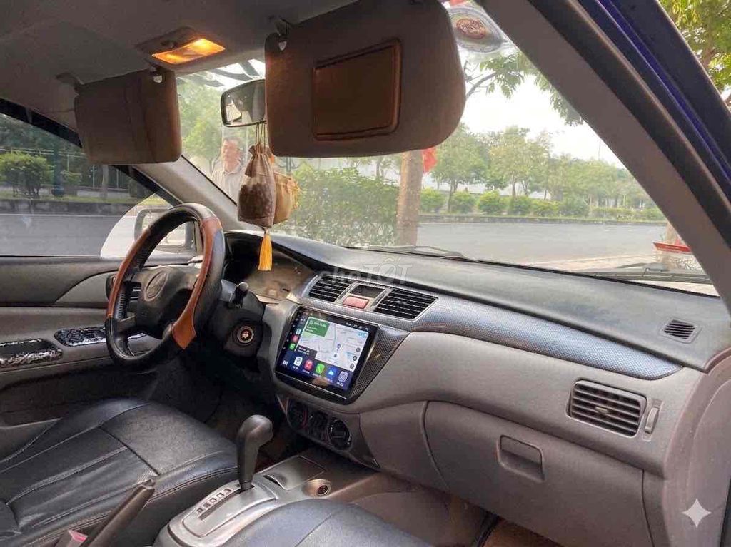 Мицубиси Лансер 1.6L Зеленый Автомат