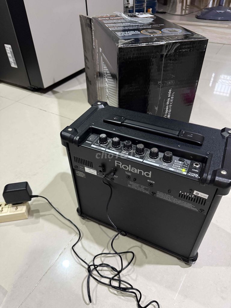 amplifier roland cube 10gx ,đàn guitar điện legend