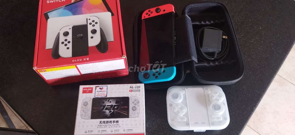 Nintendo Switch OLED 256GB Đỏ Xanh. Mua bán Thiết bị chơi game tại Thành phố Bà Rịa Bà Rịa - Vũng Tàu được đăng bởi sang hình 1