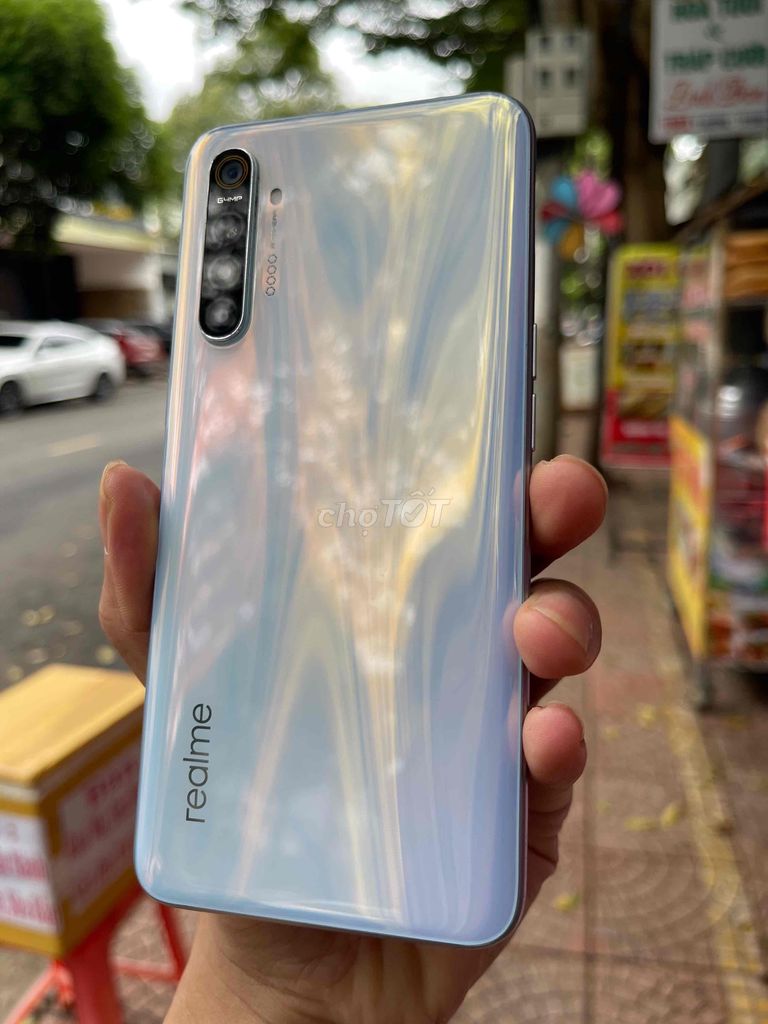 Realme XT , Ram : 8/128 G, Snap 712