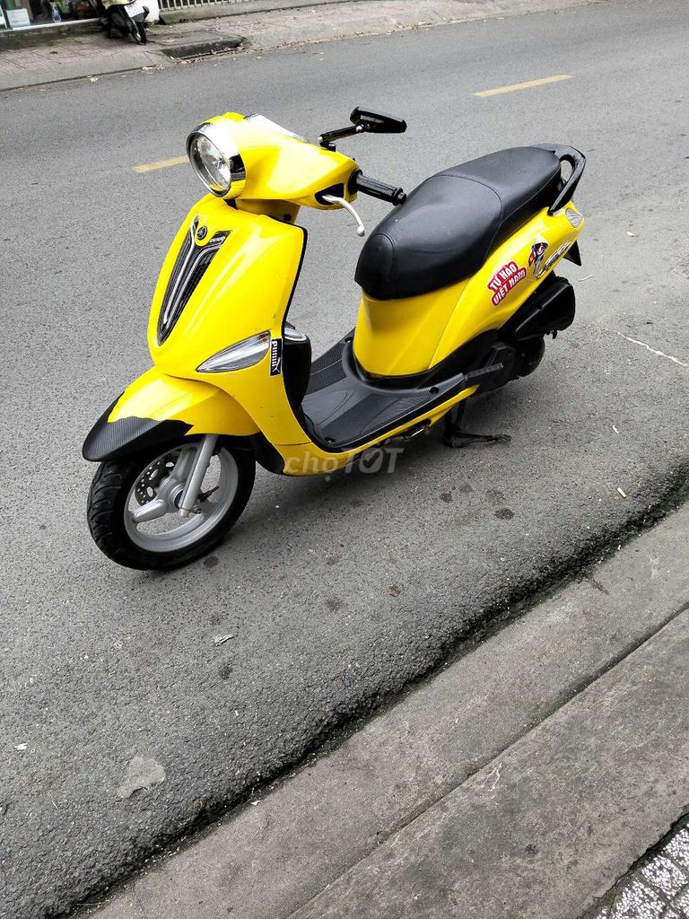 Xe máy Yamaha Nozza màu vàng, số tự động. Mua bán Xe máy tại Quận 12 Tp Hồ Chí Minh được đăng bởi Tien Dinh hình 4