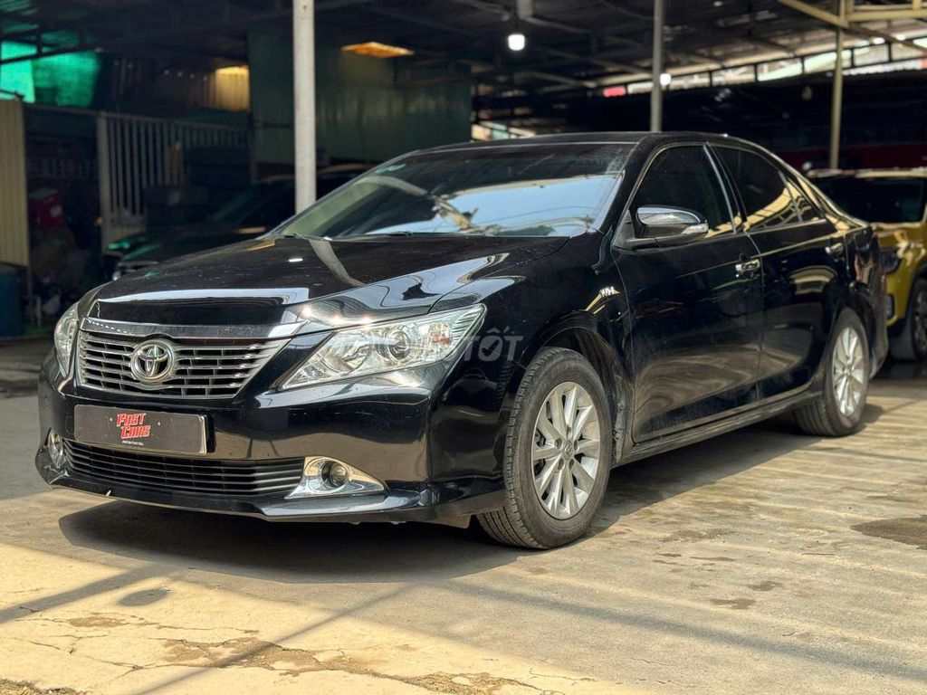 Toyota Camry 2013 2.0E, màu đen, lướt 41.000 km. Mua bán Ô tô tại Quận Bình Tân Tp Hồ Chí Minh được đăng bởi Son Do hình 3