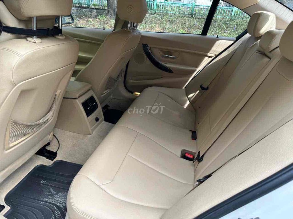 BMW 320i sx 2014 Trắng 72000 km. Mua bán Ô tô tại Quận 7 Tp Hồ Chí Minh được đăng bởi auto thanh tâm  hình 6