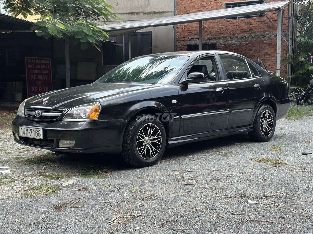 Ô tô Daewoo Magnus 2007 màu đen số tự động. Mua bán Ô tô tại Thành phố Dĩ An Bình Dương được đăng bởi Xe Máy Cũ  hình 5