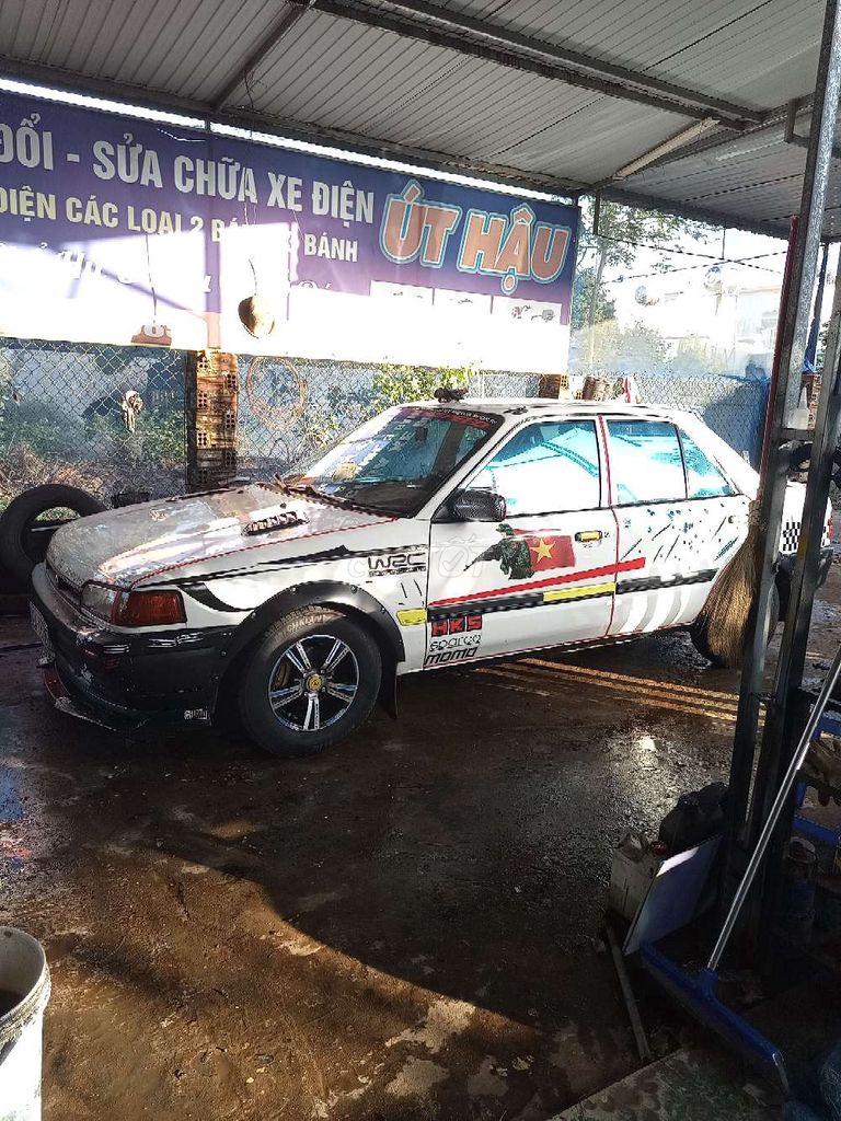 Mazda 323 Trắng 2000km. Mua bán Ô tô tại Huyện Krông Pắc Đắk Lắk được đăng bởi hau  hình 2