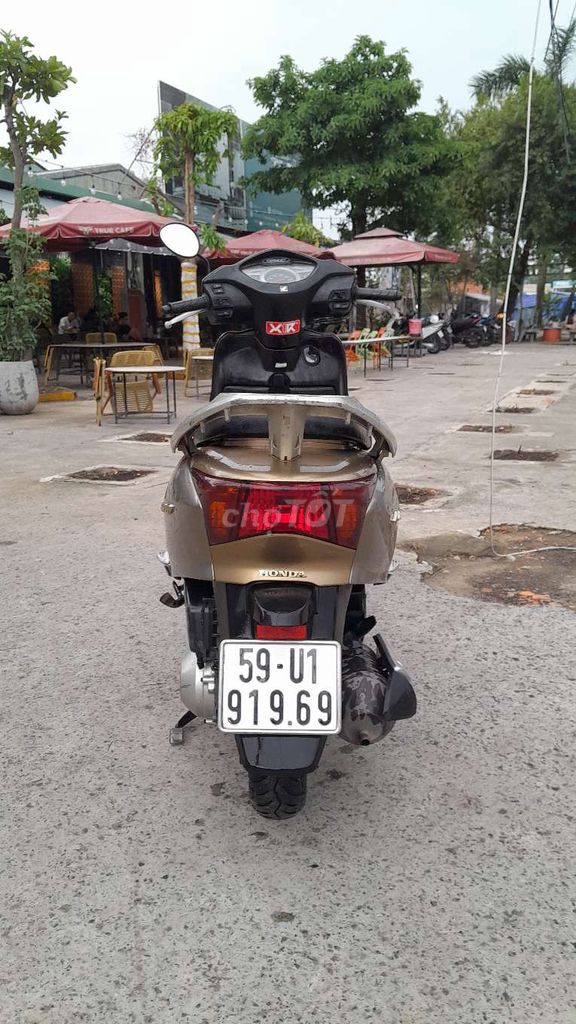 Honda Lead 110/2010 из бронзового золота