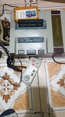 Máy Game 4 nút Micro Genius màu xám xuất xứ Nhật.