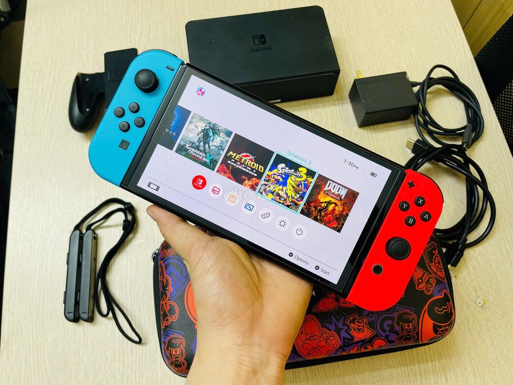 Máy Nintendo Switch OLED 128GB hắc ám DATE 2024. Mua bán Thiết bị chơi game tại Quận Đống Đa Hà Nội được đăng bởi NHẬT LỆ CAMERA hình 1