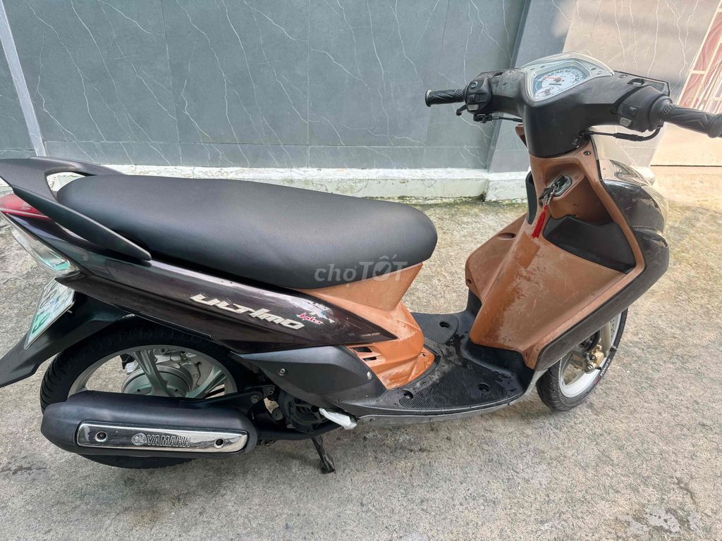 Скутер Yamaha Ultimo коричневый, черный, белый