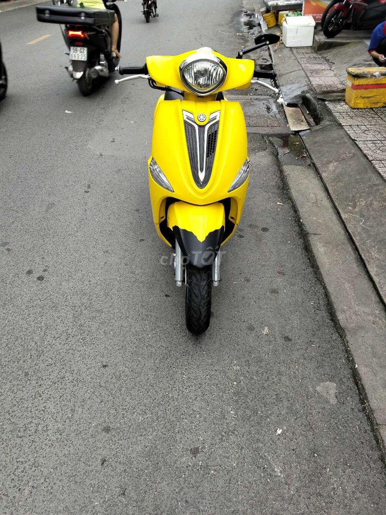 Xe máy Yamaha Nozza màu vàng, số tự động. Mua bán Xe máy tại Quận 12 Tp Hồ Chí Minh được đăng bởi Tien Dinh hình 1