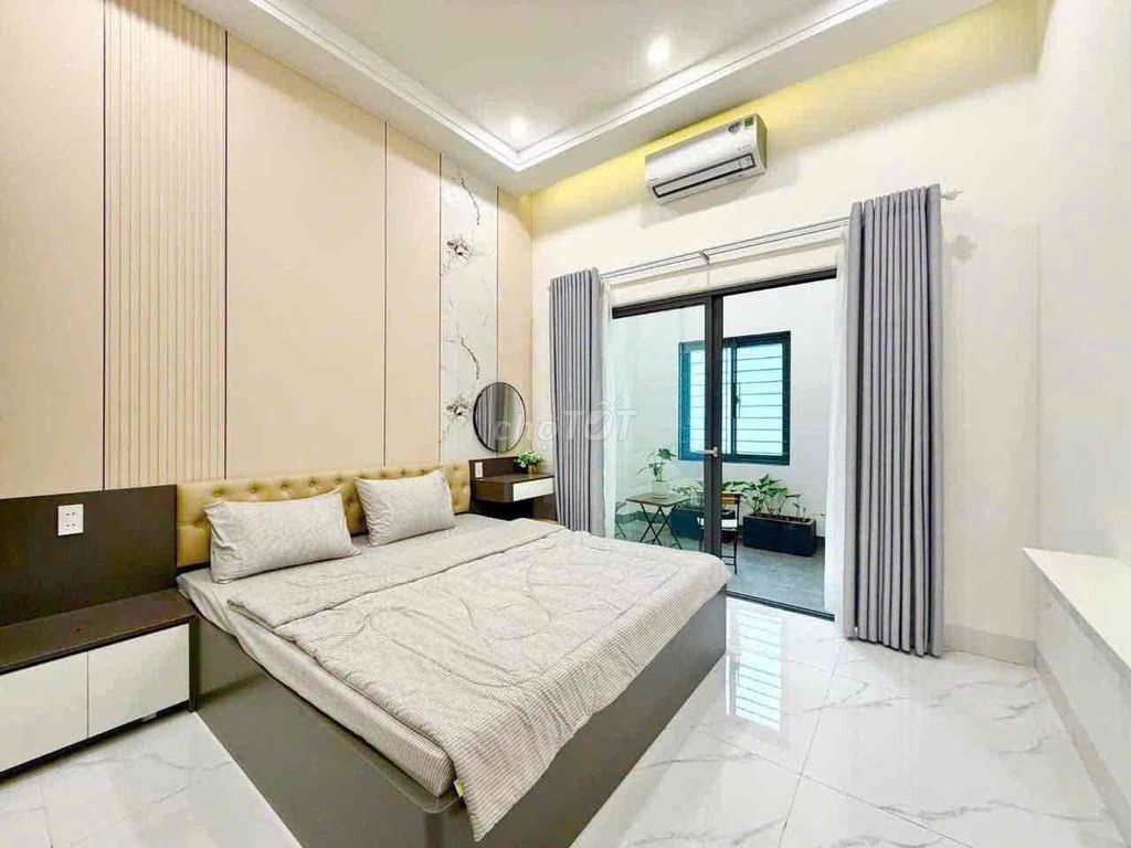 New three-storey riverside house in Hòa Xuân — photo 8
