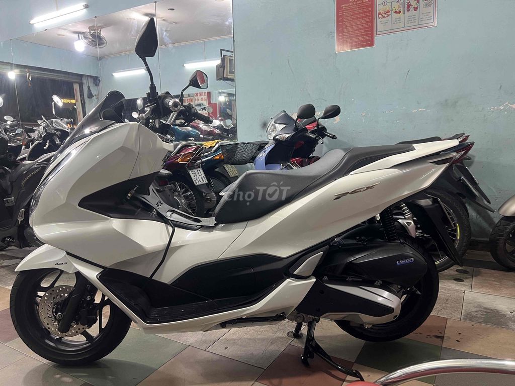 mới về (PCX)trắng tuyết mới tin zin hết nhe ac ơi. Mua bán Xe máy tại Quận Phú Nhuận Tp Hồ Chí Minh được đăng bởi CuBi Thanh Sơn hình 4