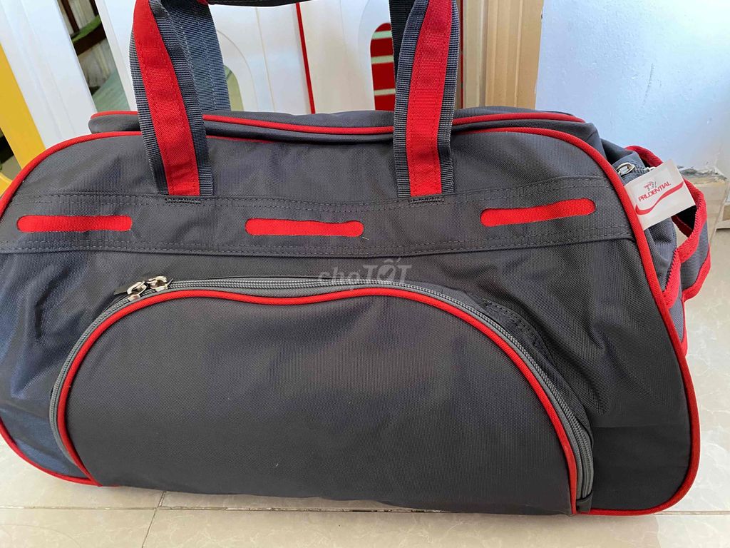 Túi du lịch Unisex Vải Xám đỏ. Mua bán Túi xách tại Quận 7 Tp Hồ Chí Minh được đăng bởi Mi hình 1