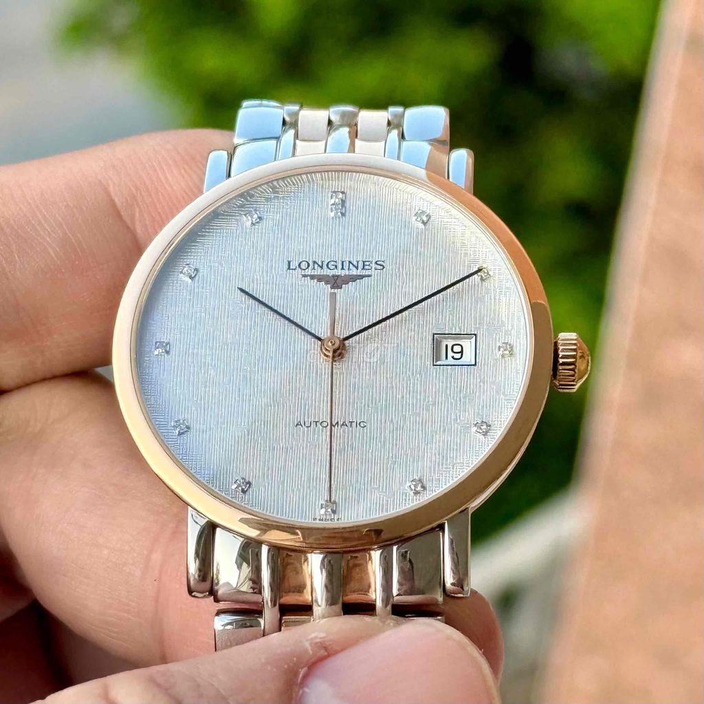 longines elegant demi 18k