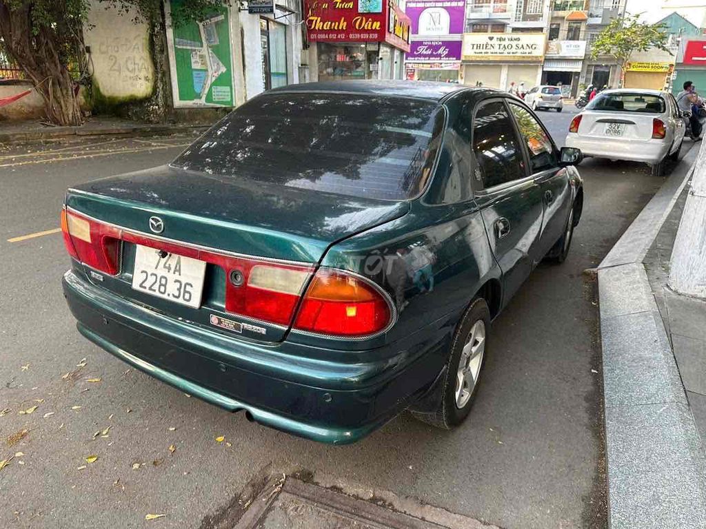 Mazda 323 2000 GLX 1.6MT - 252211 km. Mua bán Ô tô tại Thành phố Thủ Dầu Một Bình Dương được đăng bởi Ô TÔ CŨ BÌNH DƯƠNG hình 2