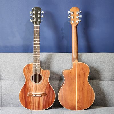 Thanh lý guitar mini 1/2 gỗ thịt tặng bao da