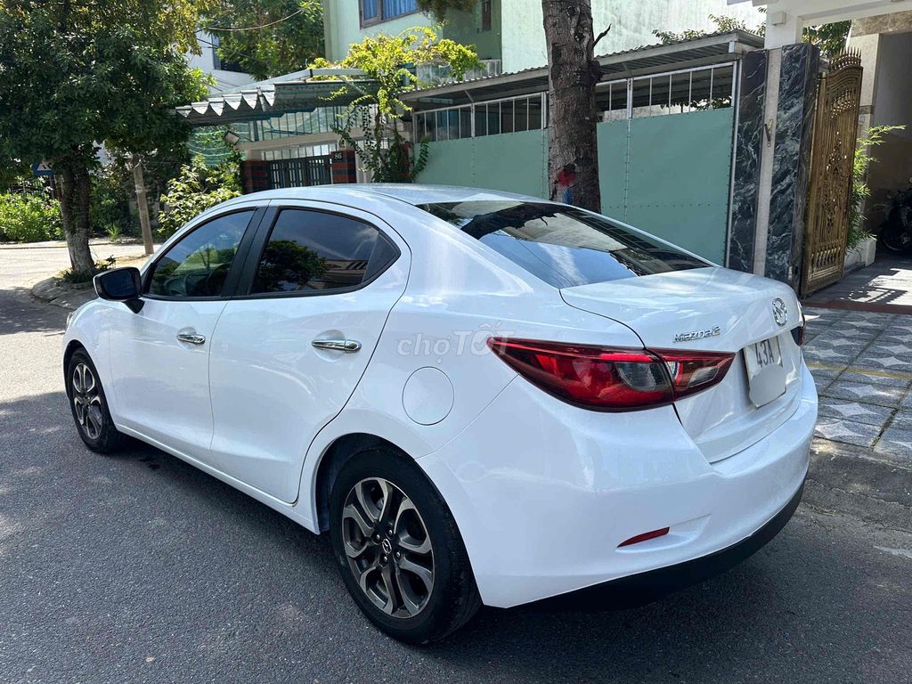 Mazda Mazda 2 2016 Белый 110 тыс. км