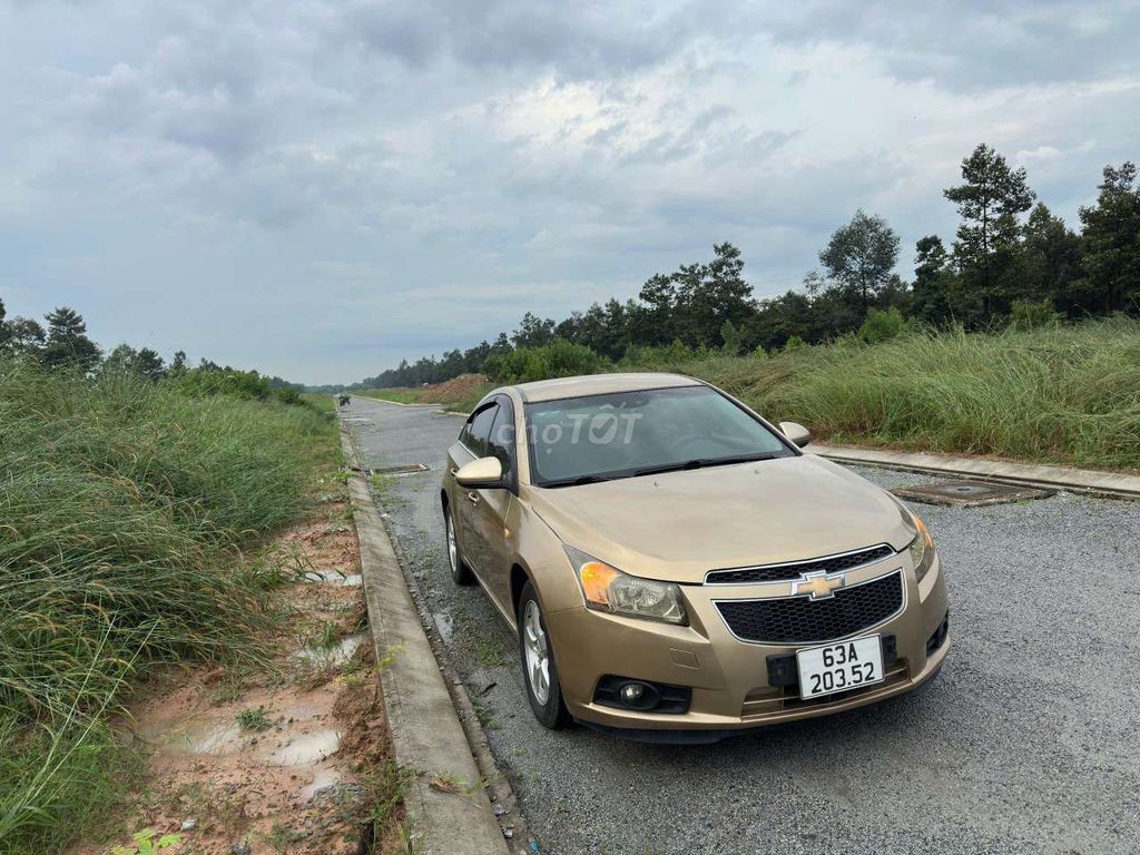 Ô tô Chevrolet Cruze 2011 số sàn màu vàng cát. Mua bán Ô tô tại Thị xã Bến Cát Bình Dương được đăng bởi lâm hiền  hình 1