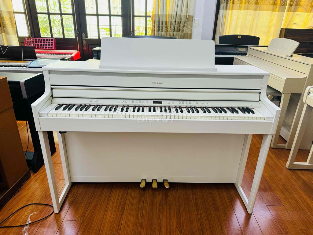 piano rolan Hp704WH hàng lướt như mới bao sip