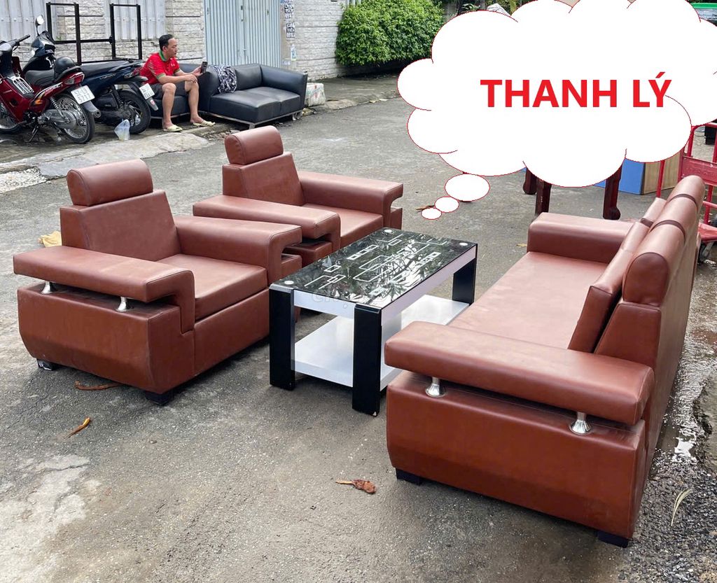 Thanh lý Bộ ghế sofa bọc da màu nâu kèm bàn