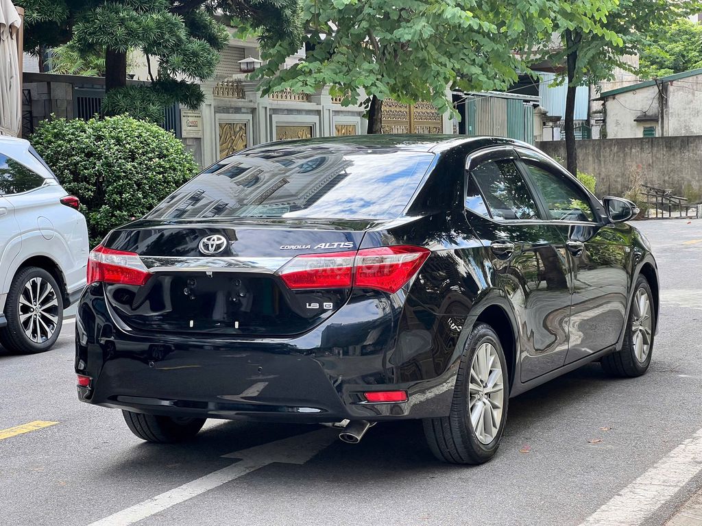 Toyota Corolla Altis 1.8G 2015 màu đen. Mua bán Ô tô tại Quận Long Biên Hà Nội được đăng bởi PHÚC LÂM  AUTO hình 7