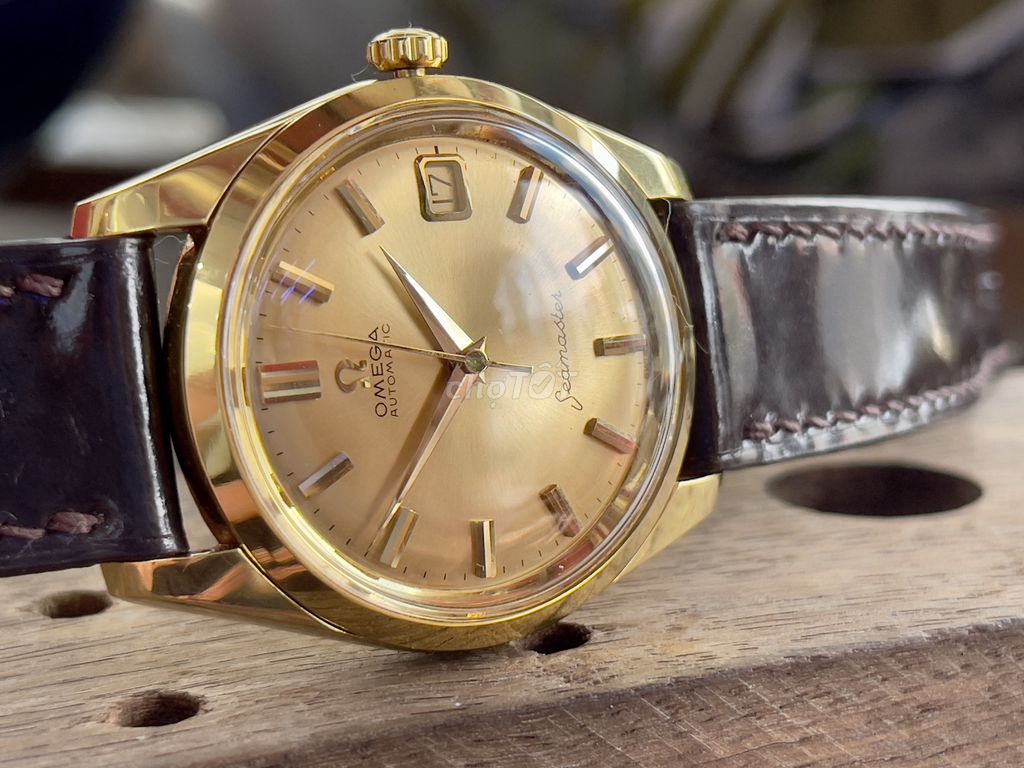 0mega seamaster 18k gold