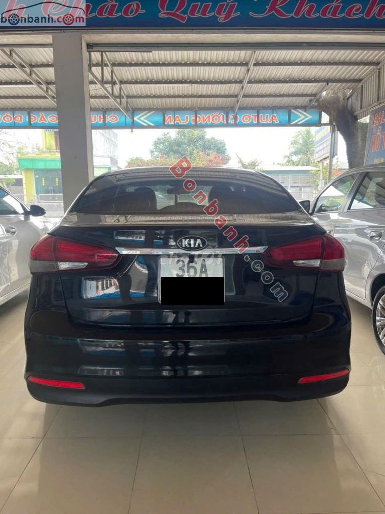 Kia Cerato màu đen. Mua bán Ô tô tại Huyện Quảng Xương Thanh Hóa được đăng bởi Lam ngoc cuong  hình 4