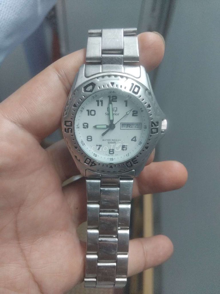 Đồng hồ Q&Q hãng Citizen size 38mm, niềng xoay