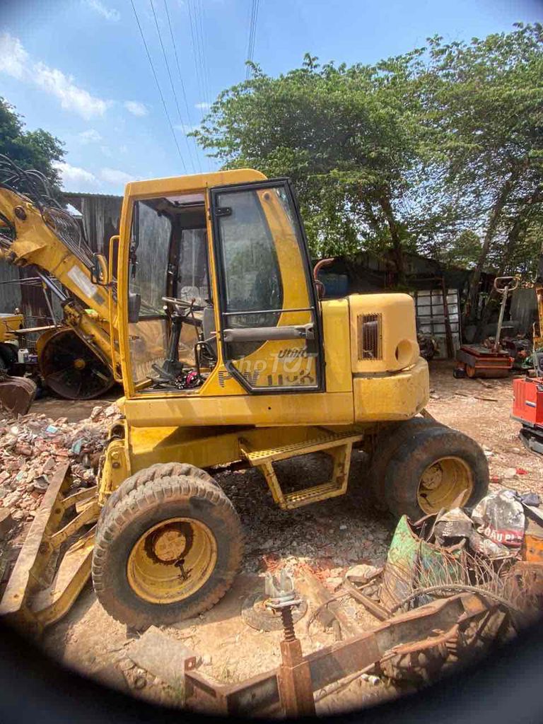 Xe xúc KOMATSU bánh lốp gàu 035