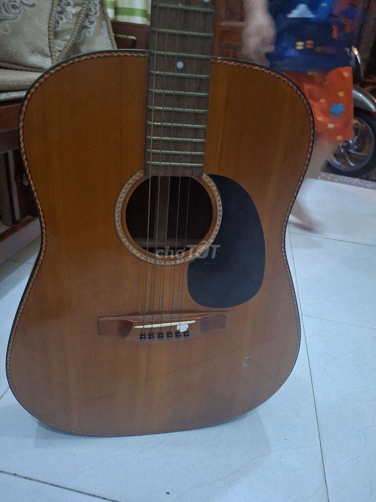 Đàn guitar gỗ màu nâu. Mua bán Nhạc cụ tại Quận Bình Tân Tp Hồ Chí Minh được đăng bởi Tân hình 1