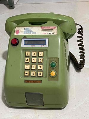 Điện thoại analog trả tiền xu cổ đã từng xài ở sg
