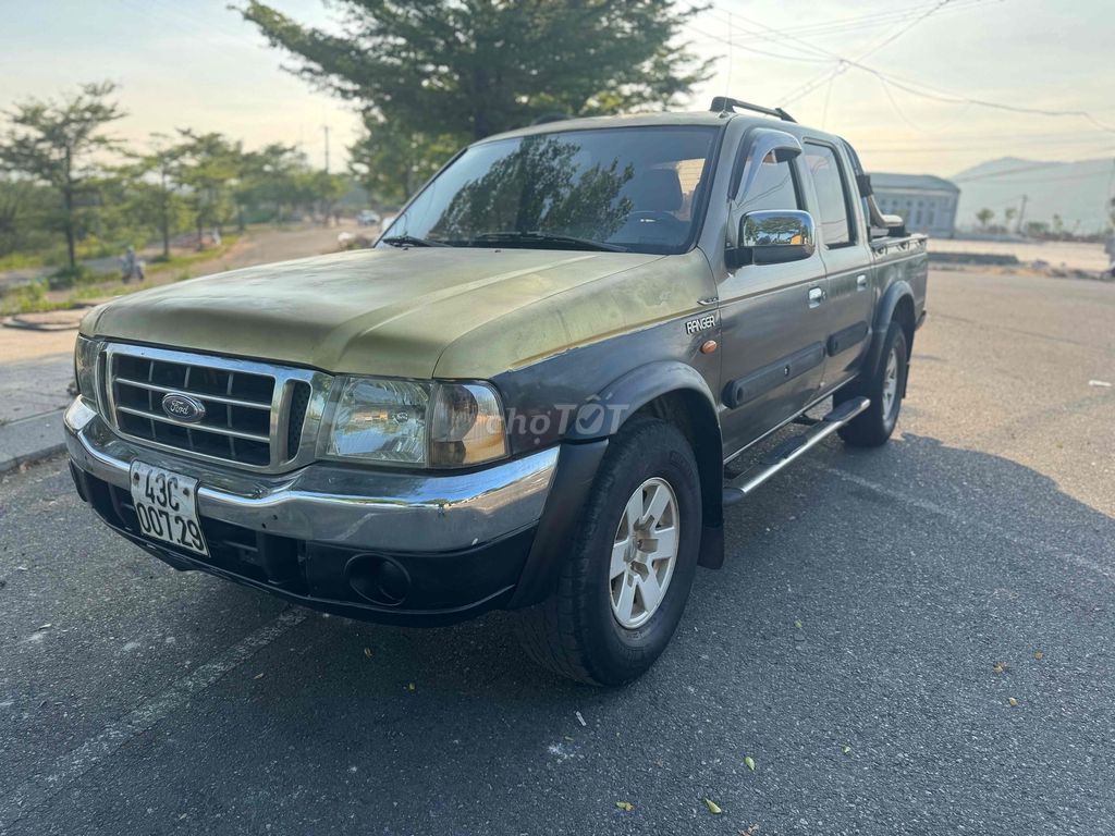 Форд Рейнджер XLT 2,5 л 4x4 MT 2004 Черное золото