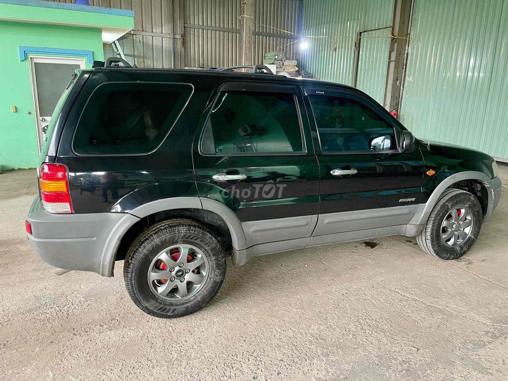 Ford Escape 2.0 MT - Odo 159.000km. Mua bán Ô tô tại Huyện Đức Hòa Long An được đăng bởi Lê Hoàng Scales hình 6