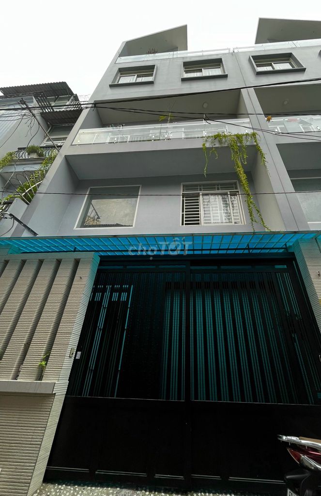 Cho thuê nhà mới hẻm xe hơi 299A Nguyễn Văn Trỗi - 6.5x10m 4 tầng