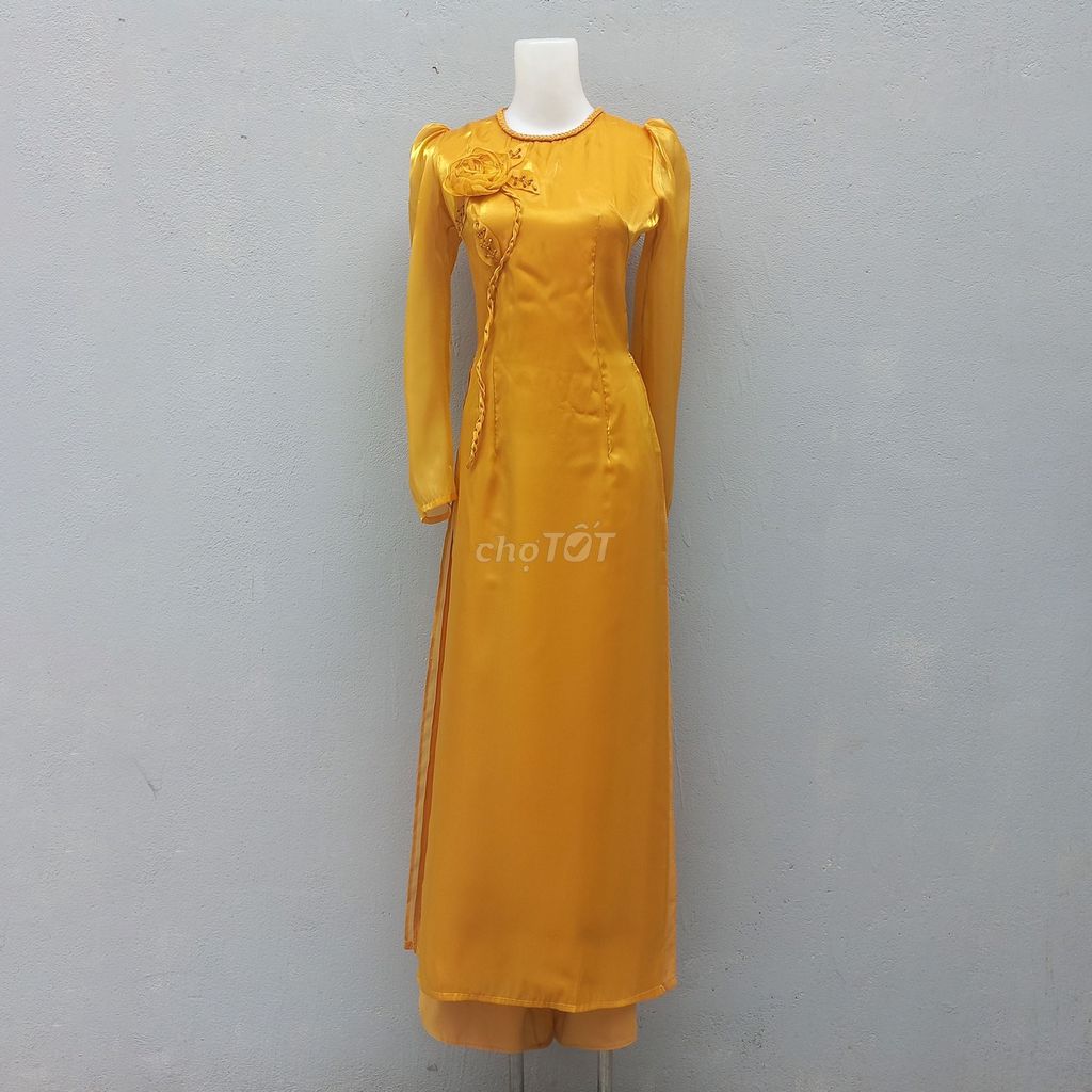 Áo dài Nữ Lụa bóng Vàng size M cũ 90%. Mua bán Quần áo tại Thành phố Long Khánh Đồng Nai được đăng bởi Shop Đồ thanh lý hình 1