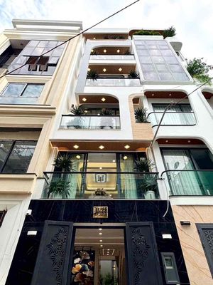 NHÀ NGUYÊN CĂN 1 TRỆT 1 LỬNG 4 LẦU GARA XE HƠI HẺM OTO FULL NỘI THẤT