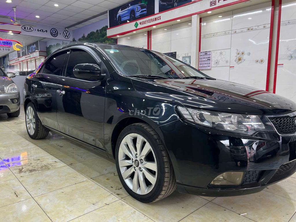 Kia Forte 2010 SX 1.6 MT - 123456 km