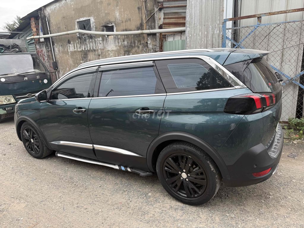 Peugeot 5008 Xanh rêu 92897 km. Mua bán Ô tô tại Thành phố Thuận An Bình Dương được đăng bởi Trần Chầm hình 4