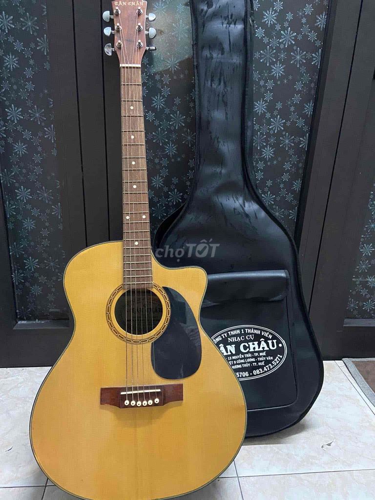 cần bán đàn guitar mới