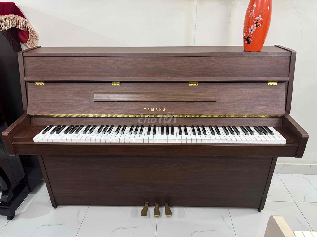 piano cơ yamaha MC1001 Serri 4tr1 tem đồng cao