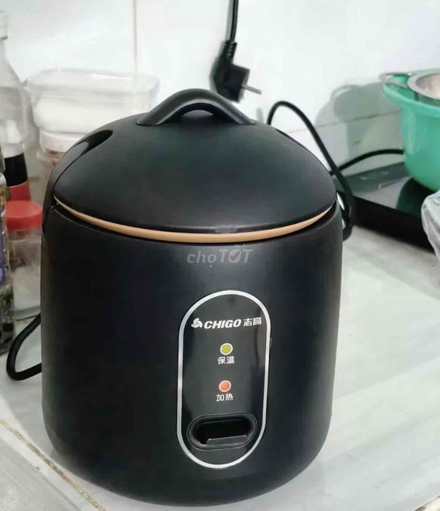 Nồi cơm điện mini Chigo Đen. Mua bán Bếp, lò, đồ điện nhà bếp tại Quận 3 Tp Hồ Chí Minh được đăng bởi Á Đông hình 1