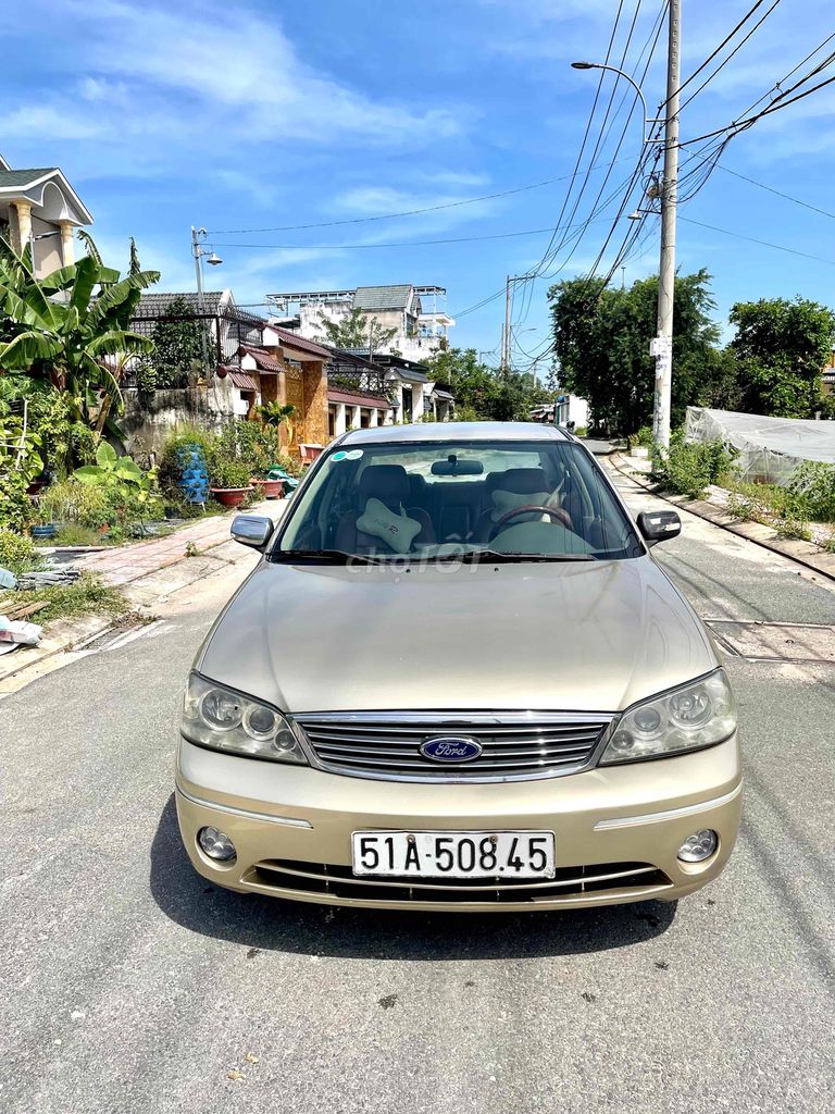 NHÀ BÁN FORD LASER ĐỜI 2004 MÁY 1.8 MT CÒN RẤT ĐẸP