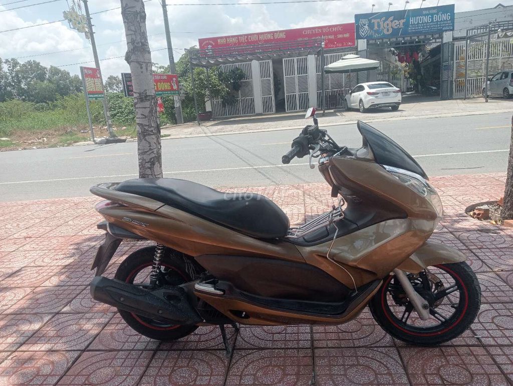 Хонда PCX 2011, золотая бронза