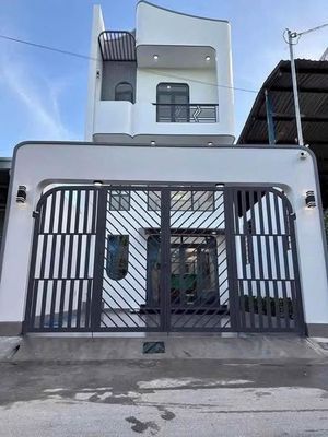 Bán nhà 2 trệt 1 lầu mặt tiền DX 59, Bình Dương