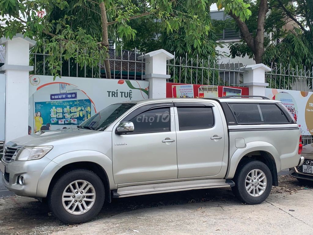 Toyota Hilux 2014 số sàn màu xám 1 cầu. Mua bán Ô tô tại Quận 12 Tp Hồ Chí Minh được đăng bởi Xuân Trường hình 4