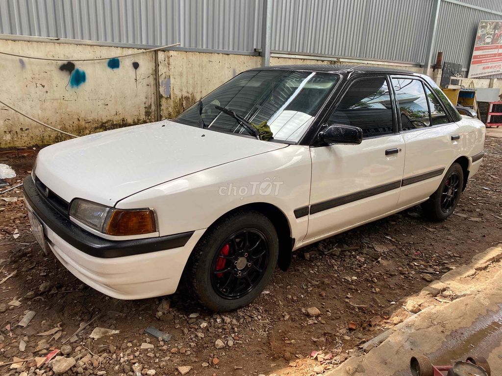 Mazda 323 1997 1.6 MT - 75000 km. Mua bán Ô tô tại Thành phố Buôn Ma Thuột Đắk Lắk được đăng bởi nhỏ hình 1